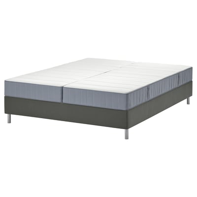 LYNGÖR bed with white mattress on gray base. Square, modern design with metal legs.