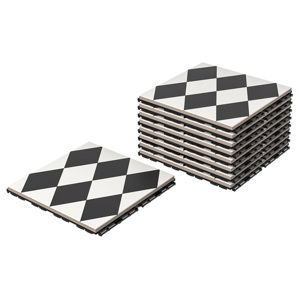 Stacked black and white diamond-shaped porcelain patio tiles.