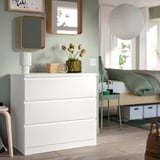MALM white chest of drawers. 3-drawer, smooth acrylic paint finish. Place near a wall for safety. Compact size fits small spaces.
