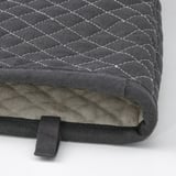 High-quality grey cushion with intricate quilted pattern, soft linen-cotton blend, and secure black strap for carrying.