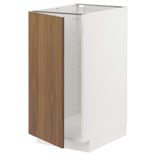 A white METOD kitchen cabinet with a single modern walnut door.
