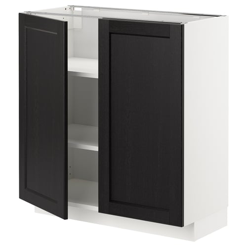 An open dark grey wooden kitchen cabinet from ikeas METOD series, featuring two doors and an adjustable shelf inside.