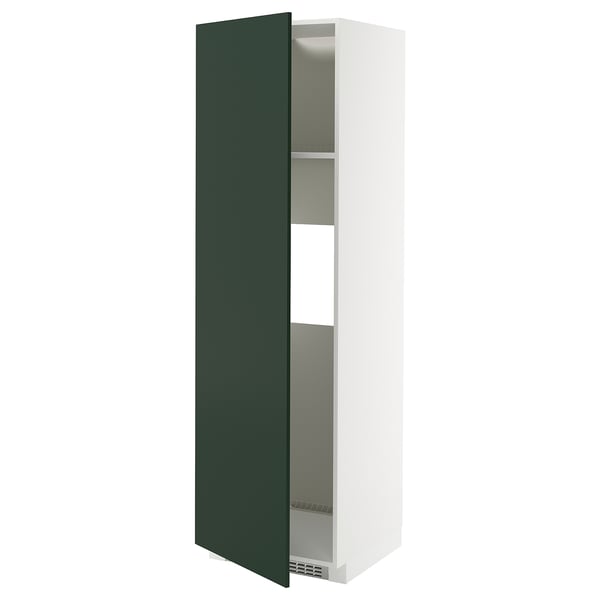 White and green METOD kitchen cabinet with adjustable shelf.