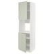 Ikea METOD kitchen cabinet in green with two open doors and shelves.