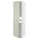 Displays a tall, green, METOD kitchen cabinet with light green stensund doors and a white frame, featuring a modern and crafted look.