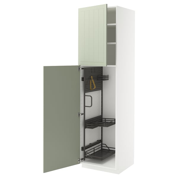 METOD kitchen cabinets with stensund green doors. The white cabinet is open, revealing pull-out organizers and metal shelves.