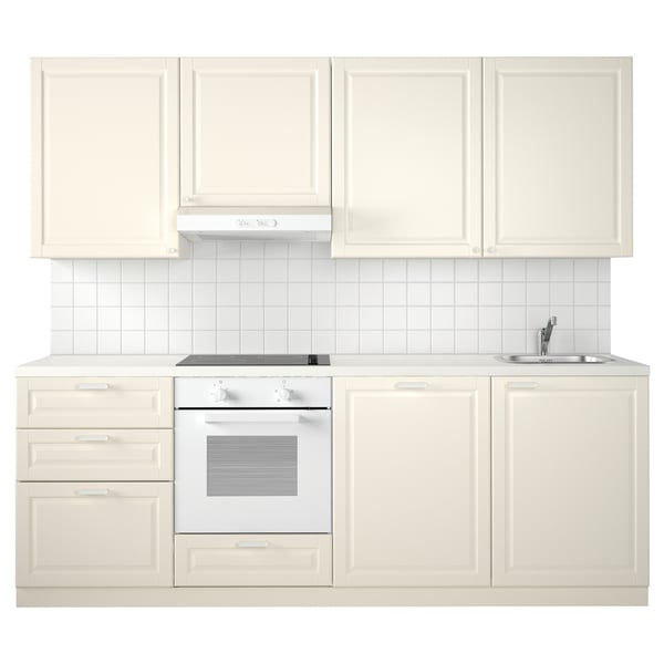 Minimalist white kitchen setup with cream cabinets, sink, and oven. Bright and modern design, ideal for small spaces.
