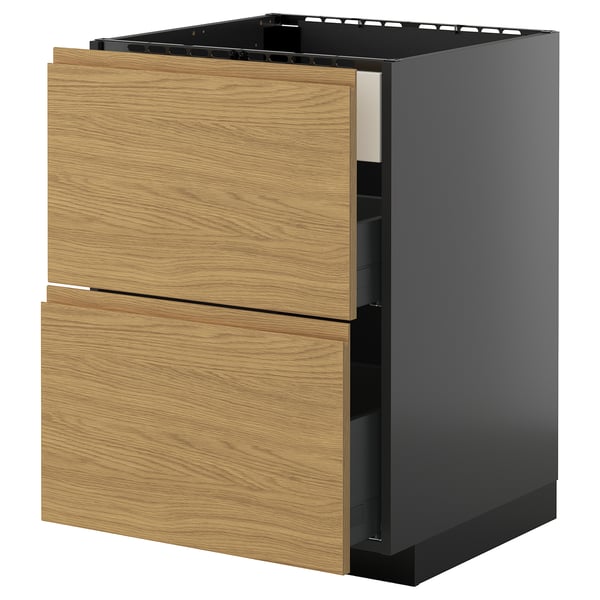 A modern kitchen cabinet named METOD, featuring light wood-grain drawers with sleek, integrated handles, set into a dark gray base.