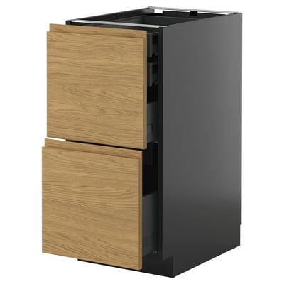 A modern, dark gray kitchen cabinet with two wooden drawers featuring an oak finish. The drawers have integrated handles and smooth runners.