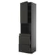 Modern black kitchen cabinet with sleek matt finishes, drawers, and shelves.