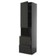 A sleek, tall, black METOD kitchen cabinet with a modern design, featuring both drawers and shelves for storage.