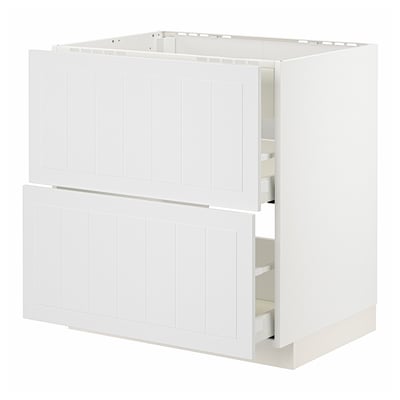 White METOD kitchen unit with two drawers, one open.