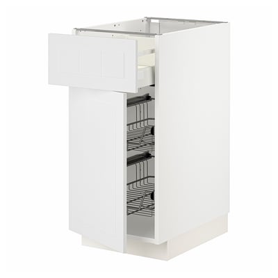 White METOD kitchen cabinet with pull-out wire baskets.
