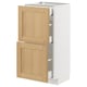 METOD white cabinet with oak doors and open drawers.