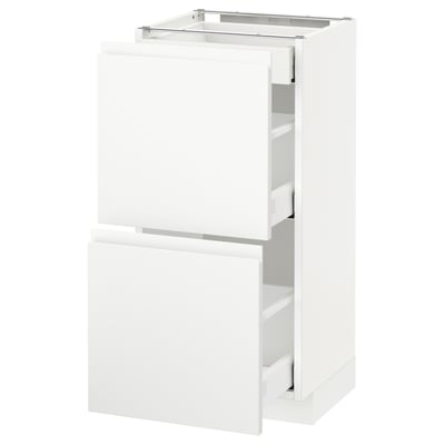 White METOD kitchen cabinet unit with drawers and doors, minimalist design.