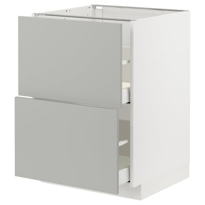 White METOD kitchen unit with light grey drawers and doors.