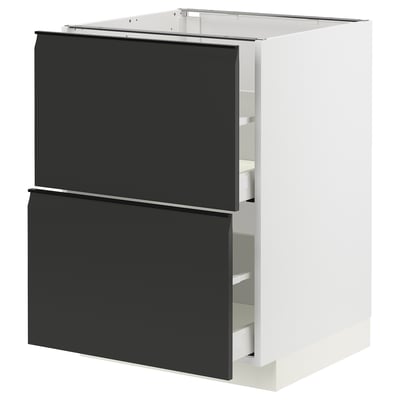 An ikea METOD kitchen cabinet in white with two matte black drawers featuring integrated handles and a modern design.