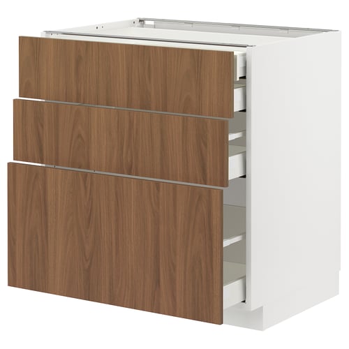 A METOD kitchen unit with tistorp walnut-colored drawers and a white base. It has multiple drawers in a sleek design.