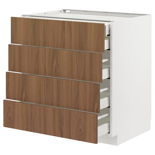 Modern white METOD cabinet with walnut-colored drawers, sleek design.