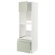 A white METOD kitchen cabinet with green stensund doors and drawers. It a tall, slim design with adjustable shelves and a smooth, soft-closing drawer.