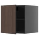 This image shows a dark brown wooden cabinet with a single door open, revealing two shelves inside.