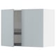 This image shows a grey-blue, high-gloss METOD kitchen wall cabinet with one open door revealing an adjustable shelf and dish drainer.