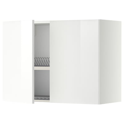 A white METOD kitchen cabinet with one door open, revealing a dish drainer inside.