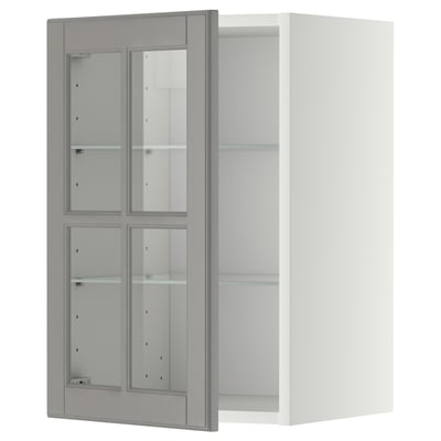 A grey METOD wall cabinet with glass doors, featuring an adjustable shelf and sturdy frame.