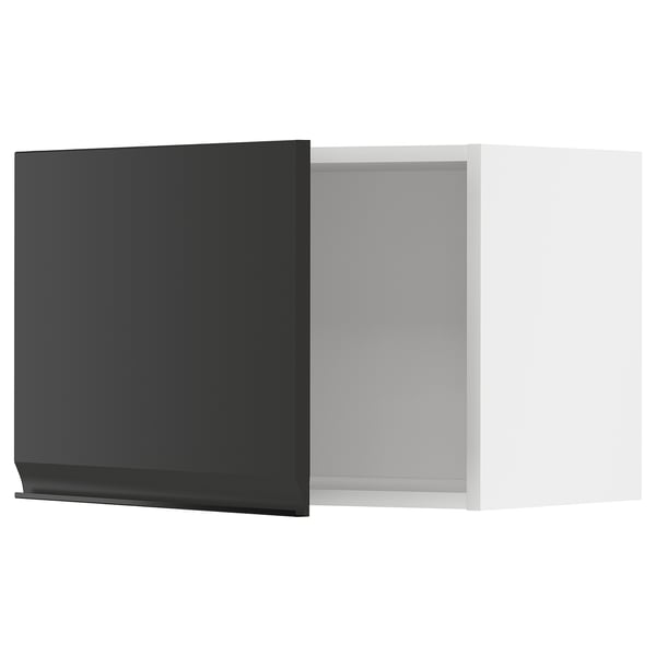 A sleek, modern black kitchen cabinet with a matte finish and a seamless handle, part of the METOD kitchen system.