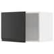 A sleek, modern black kitchen cabinet with a matte finish and a seamless handle, part of the METOD kitchen system.