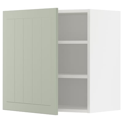 Green METOD kitchen cabinet with adjustable shelves.