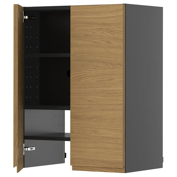 A modern kitchen cabinet, named METOD, with oak-effect doors and grey sides, featuring a minimalist design with integrated handles.