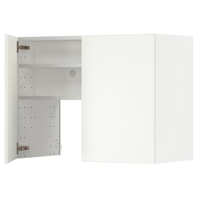 Open white cabinet from ikea METOD line, showing adjustable shelves and metal hinges.