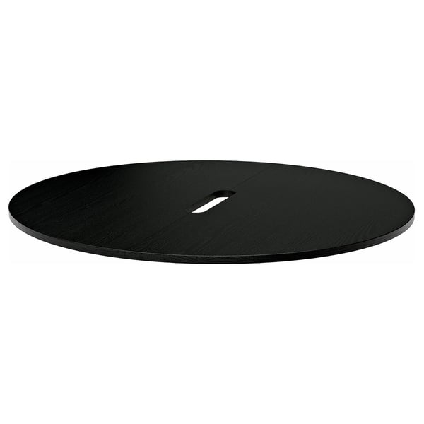 A black MITTZON table top. Its round with a smooth surface. Made of particleboard and ash veneer.