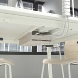 Under table: white MITTZON plug module. Connects 2 table tops and stools.