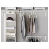 Closet with adjustable white hanging rods displaying neatly organized clothes on hangers and shelves.