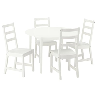 White NÄSINGE dining set with round table and four ladder-back chairs.