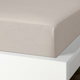 A fitted sheet with elastic edges, made of soft, breathable cotton, featuring a 152-thread count.
