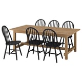 Oak dining set with 6 chairs, blending rustic & modern styles.