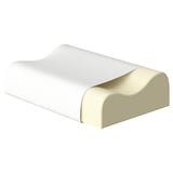 A pillow with a white fabric cover and a contoured foam insert.