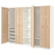Option: Ikea PAX wardrobe: light wood and white, tall with shelving, drawers, and hanging space for clothes. Modern, functional design.