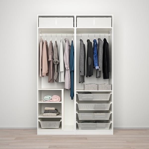 Modern closet with clothes and storage solutions, including baskets and shelves for efficient organization.