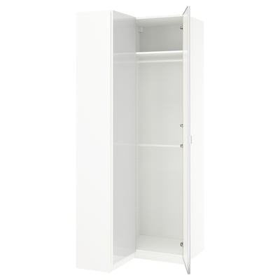 An open white ikea PAX wardrobe with shelves and hanging space.
