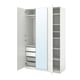 A white ikea PAX wardrobe with mirror doors and internal storage shelves.
