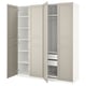 A PAX wardrobe in light beige with open doors revealing shelves and drawers.