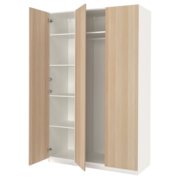 An open ikea PAX wardrobe in white and light wood, showcasing an organized internal storage system with shelves and a hanging rod.