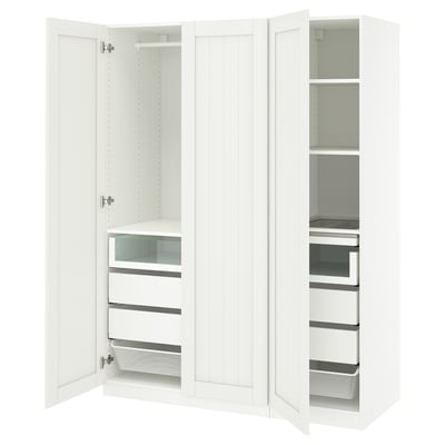 A white PAX wardrobe with open doors, featuring shelves and drawers.