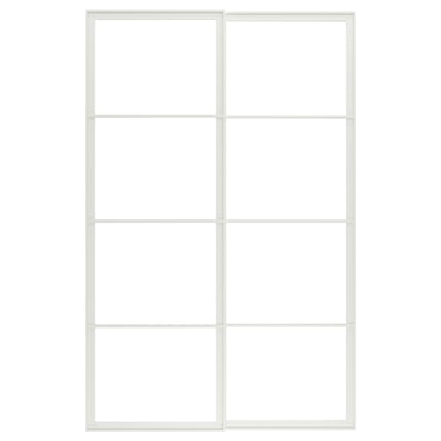 An empty white PAX wardrobe frame for sliding doors.
