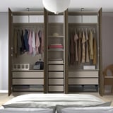 Modern wardrobe with organized clothes, shelves, storage bins, and mesh drawers.