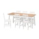 A pine and white wooden dining set called PINNTORP, including a rectangular table and six matching chairs with high backs.